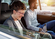 people sitting in car