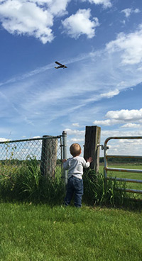 Watching plane in sky