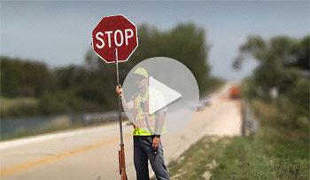 Flagger with stop sign