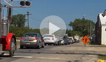 Pilot car driving  through one lane