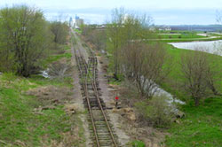 fence near rail tracks