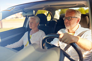 Couple driving car