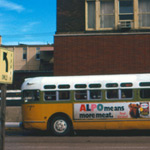 1970s bus parked at curb